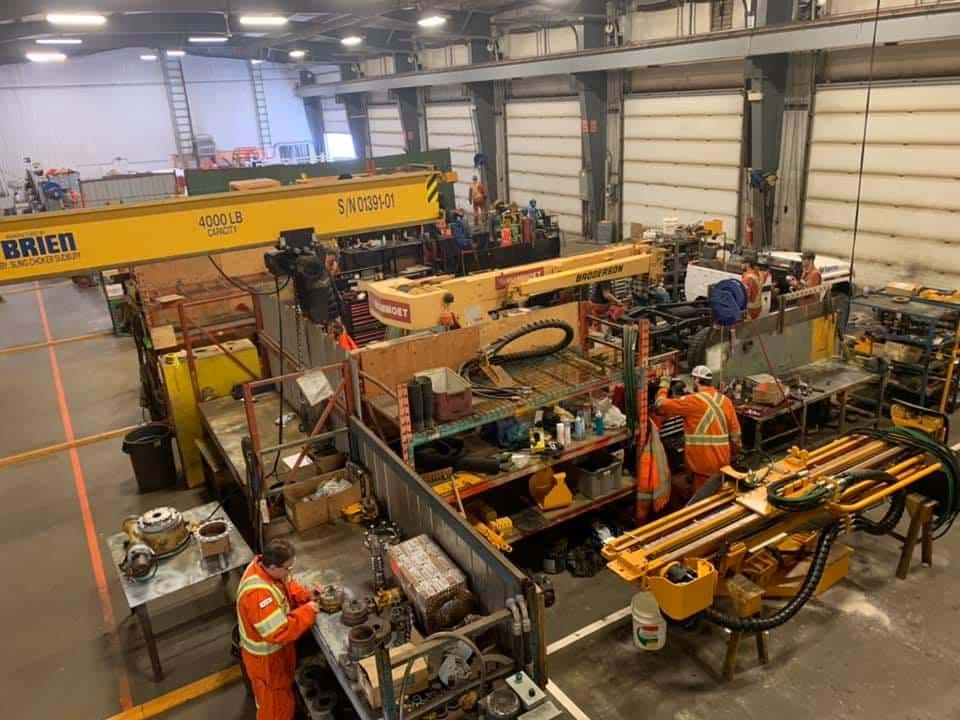 TES shop team and mining equipment